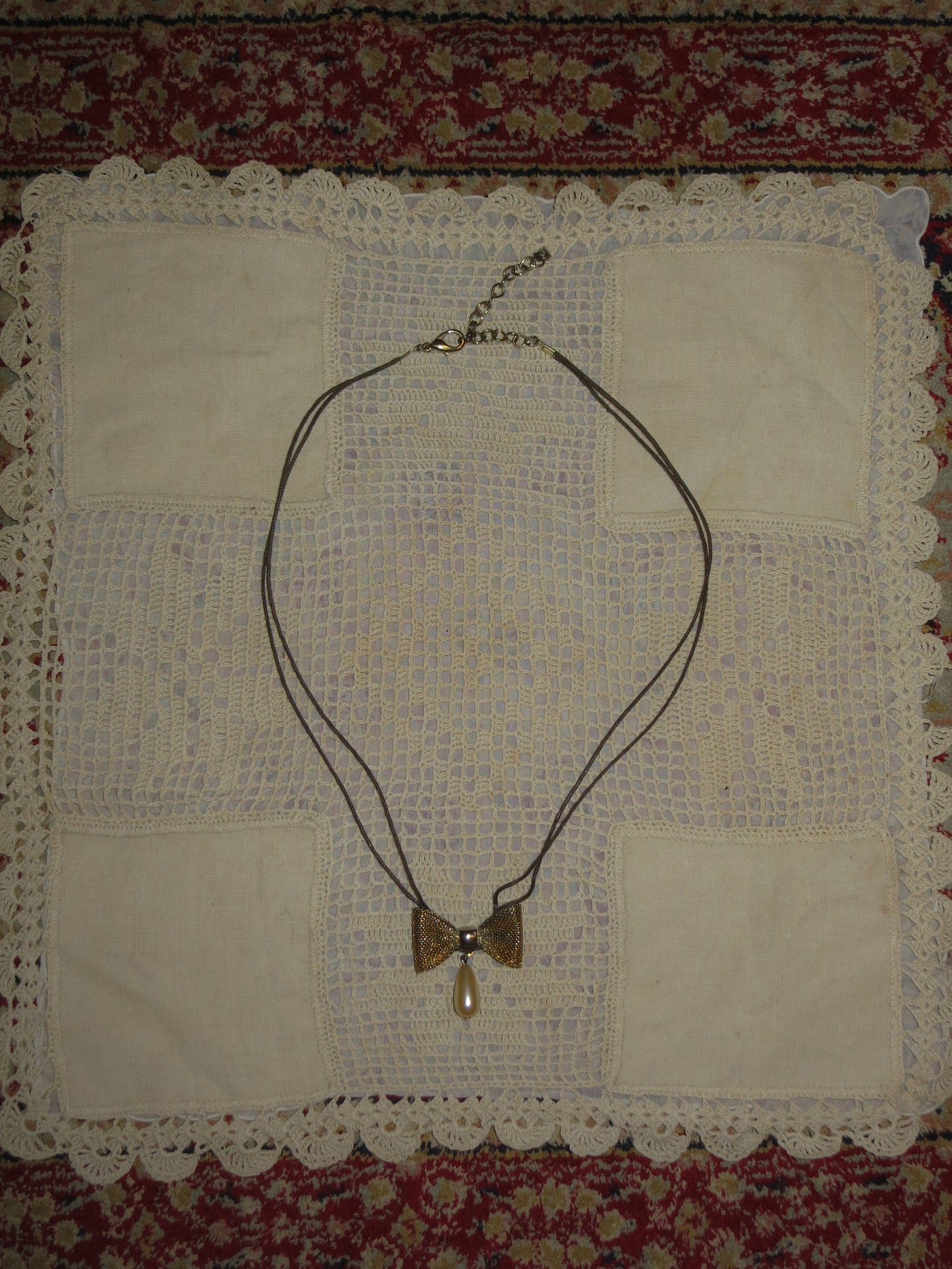 Bow with Pearl Necklace